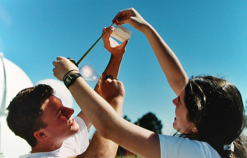 Measuring the Sun's luminosity with a lightbulb and wax.